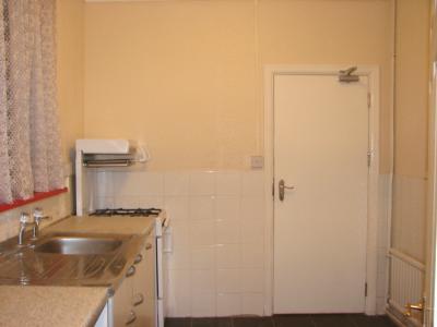 Kitchen with Gas Cooker and Door to Hall